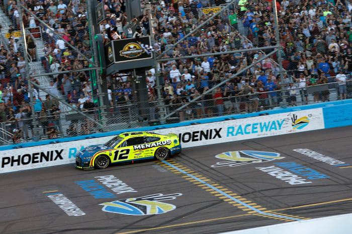 Ryan Blaney crosses the finish line to win the 2023 NASCAR Cup Series Championship, finishing first of the Championship 4 drivers Sunday at Phoenix Raceway. (Photo by Chris Graythen/Getty Images)